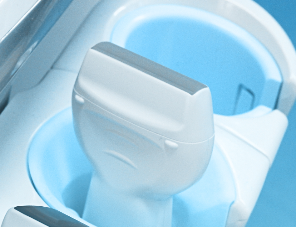 Close-up of a pair of light blue electrical outlets featuring round designs and a slight tilt. The blue background gives a modern and clean vibe.